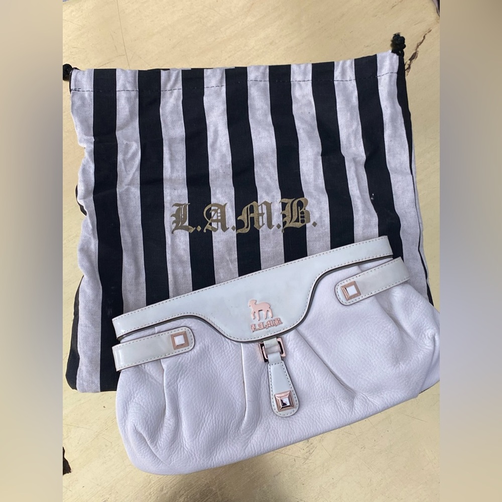 L.A.M.B. Clutch Off White with Rosegold hardware.